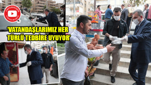 Maske dağıtarak “Sokağa çıkmayın” dedi