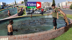 Sıcaktan bunalar çocuklar soluğu süs havuzunda aldı