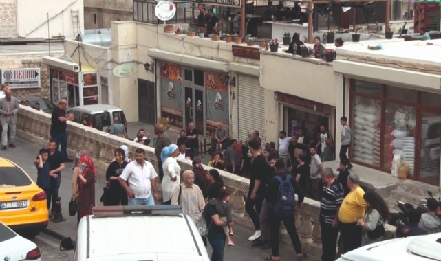 Çarşı merkezinde iki aile arasında silahlı kavga! Çok sayıda yaralı var