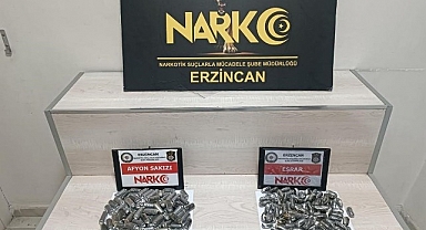 Midelerinde uyuşturucu taşıyan 2 şüpheli tutuklandı