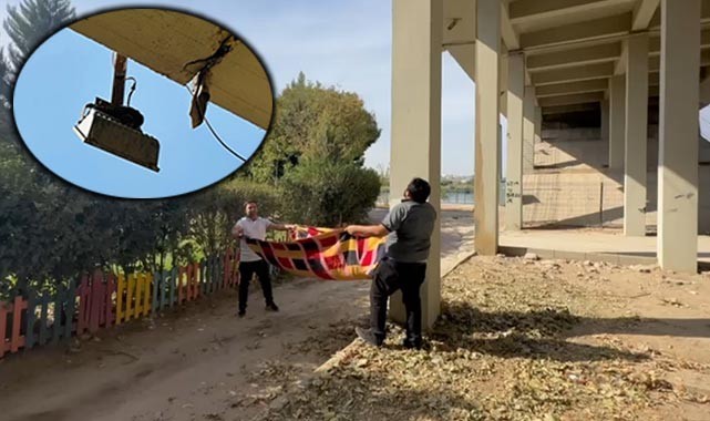 Birecik köprüsünde mahsur kalan kedi battaniye ile kurtarıldı
