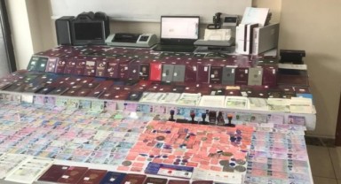 Sahte pasaport operasyonu: gözaltı var