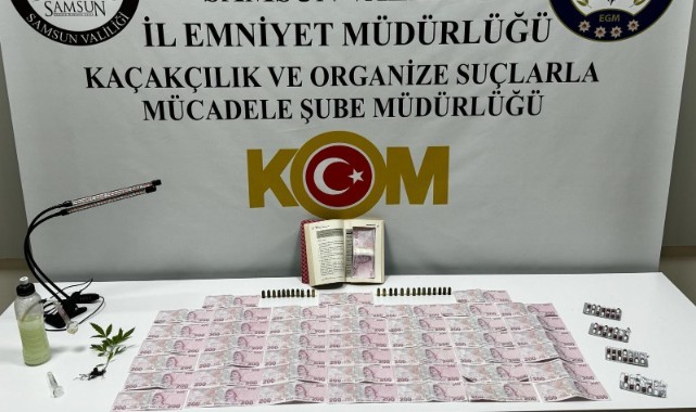 Kitabın arasına gizlenmiş sahte banknot ele geçirildi