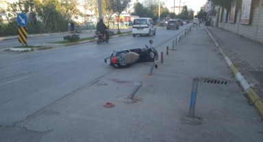 Otomobille çarpışan motosiklet sürücüsü yaralandı